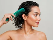 Is Oiling Good for Hair? Benefits, Risks & Right Way Indian woman gently applying hair oil to scalp at home