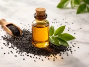 Kalonji Oil Benefits: Complete Guide to Black Seed Oil for Health, Hair & Skin in India Kalonji oil bottle with black seeds showing natural health benefits