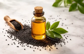 Kalonji Oil Benefits: Complete Guide to Black Seed Oil for Health, Hair & Skin in India Kalonji oil bottle with black seeds showing natural health benefits